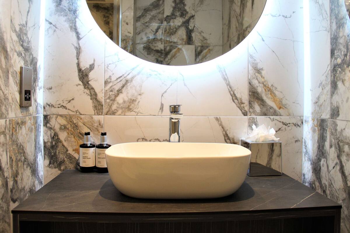 free toiletries, hair dryer, heated floors, towels