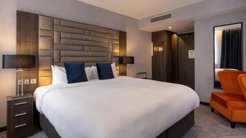 Egyptian cotton sheets, premium bedding, down duvets, minibar