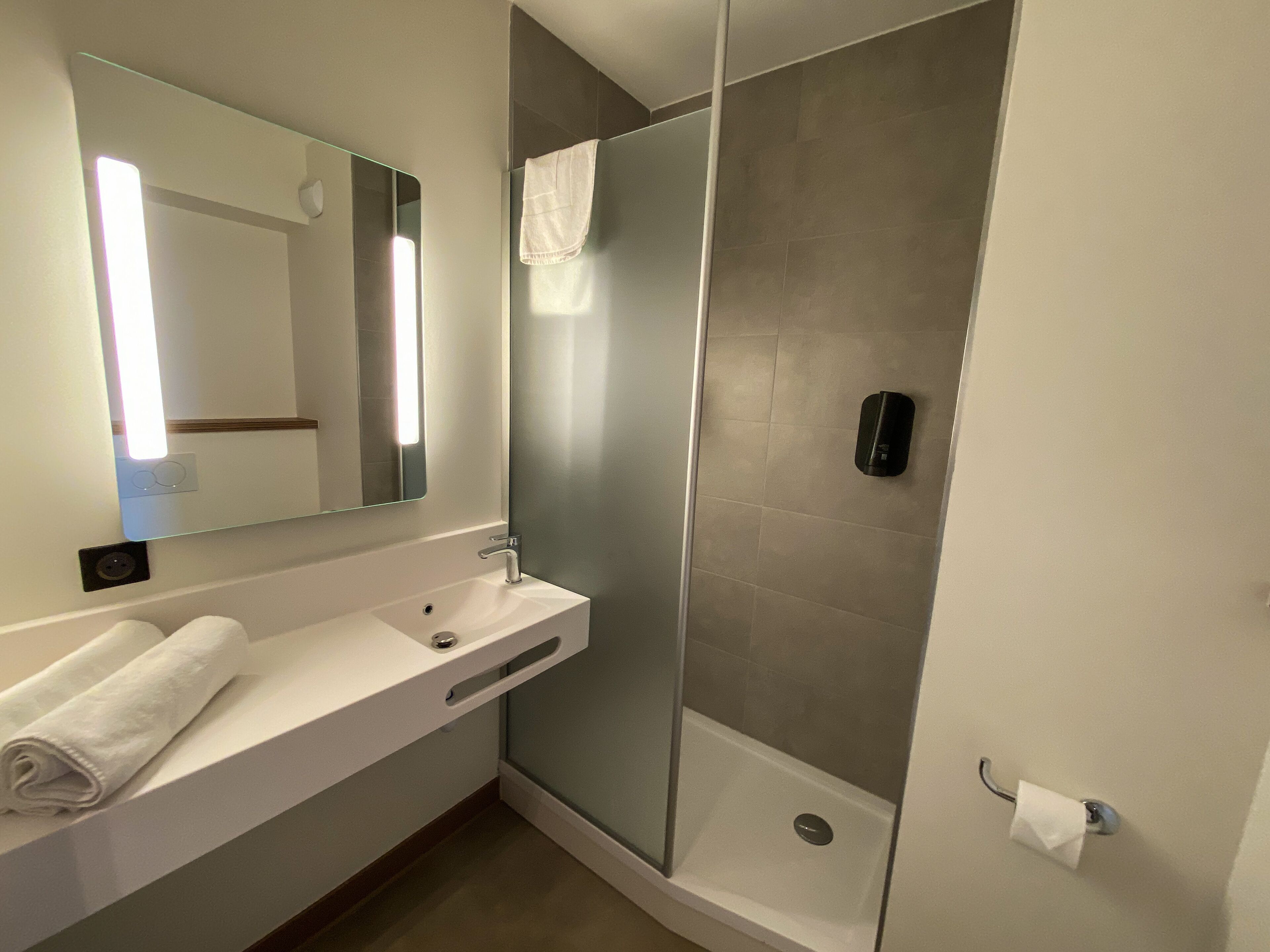 shower, towels, soap, toilet paper