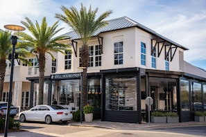 A modern building with a storefront labeled 'IDYLL HOUND PROPS.'