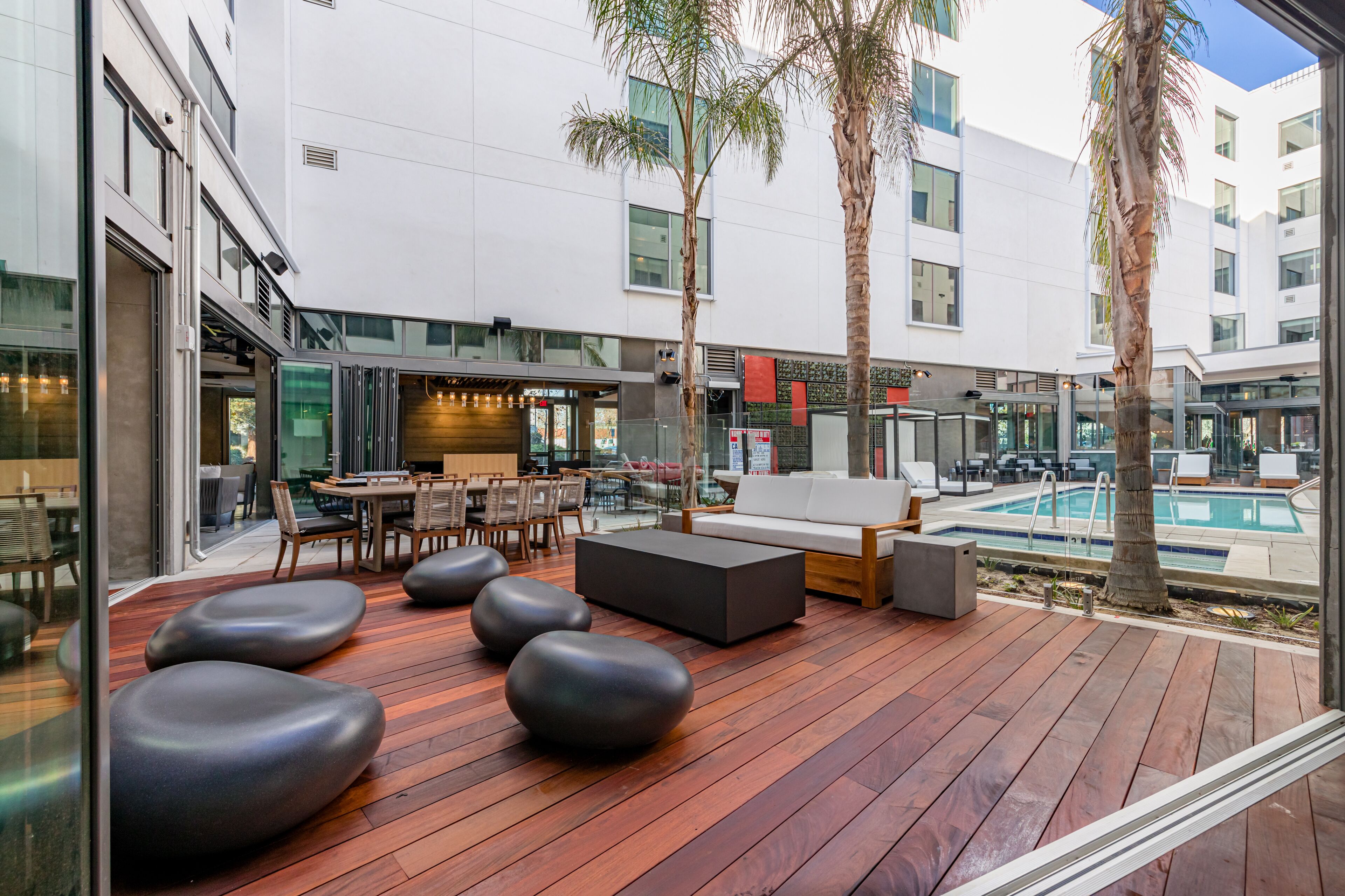 Outdoor pool, open 6:00 AM to 10:00 PM, sun loungers