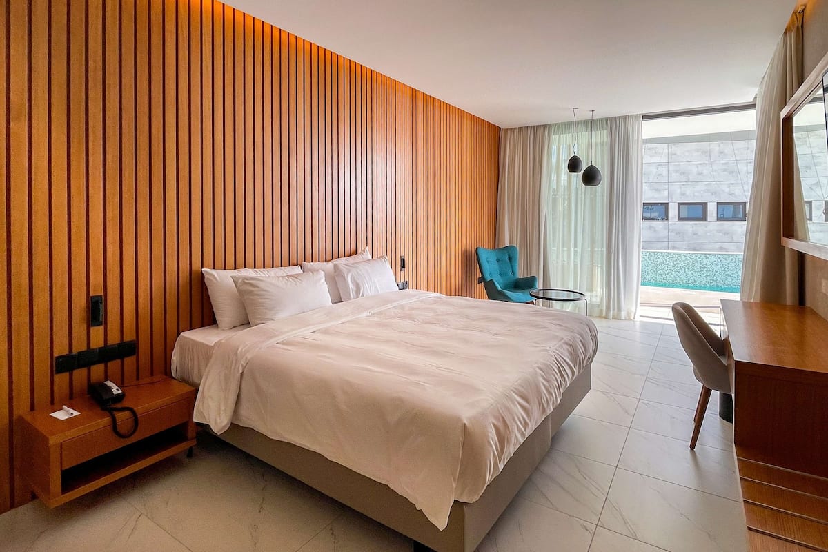 Premium Room, Balcony (Swim Up) | 1 bedroom, minibar, in-room safe, desk