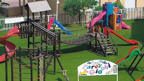 A playground with multiple slides and climbing structures. - Tropea Mare Pace Club (Tropea)