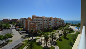 A hotel with multiple floors, a swimming pool, and a view of the ocean. - LAS ARENAS 235 - Two Bedroom Apartment, Sleeps 5 (Punta del moral)