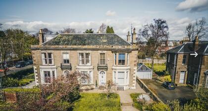 A luxurious Victorian mansion garden apartment