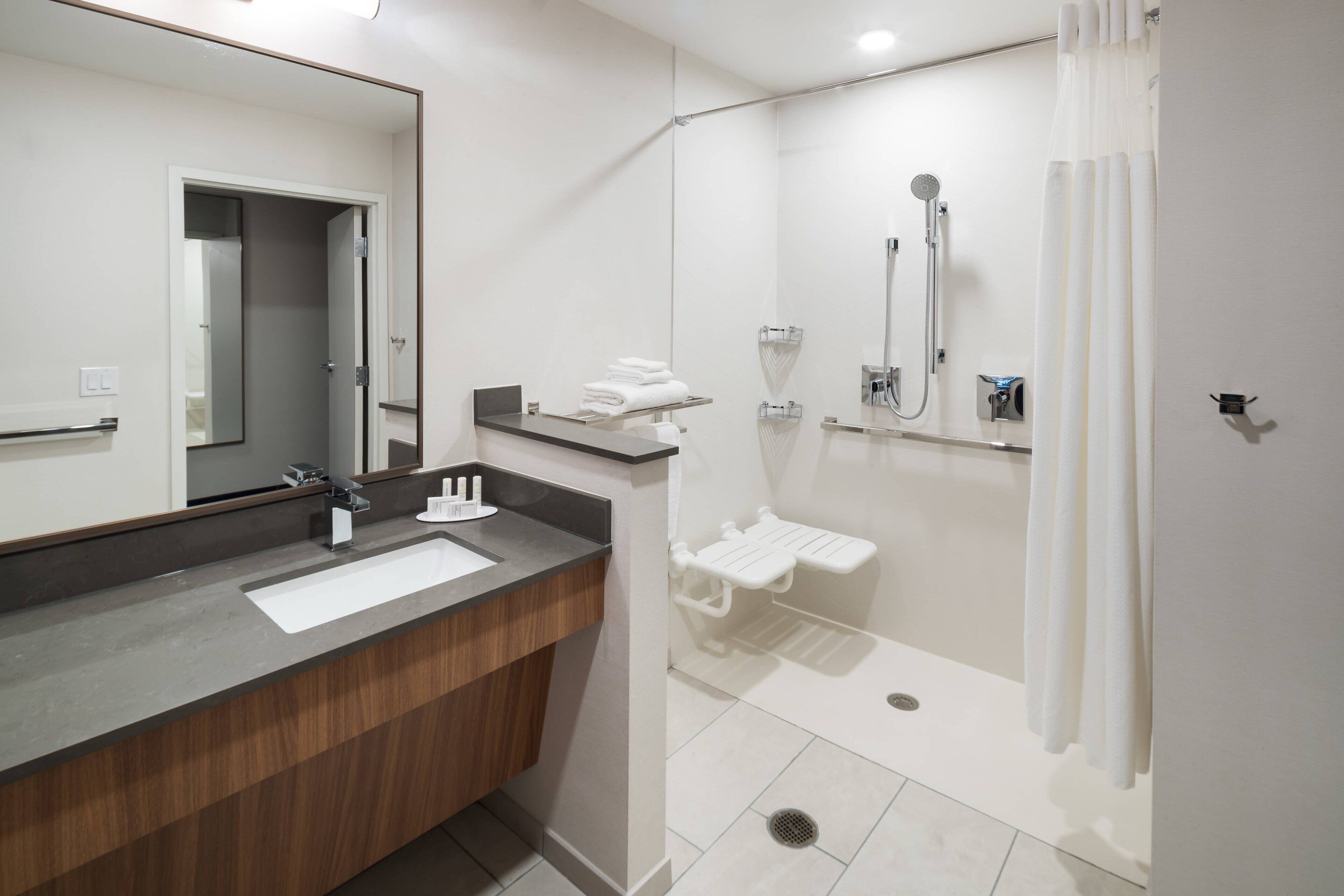 hair dryer, towels, soap, shampoo