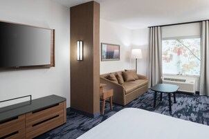 55-inch flat-screen TV with cable channels, TV