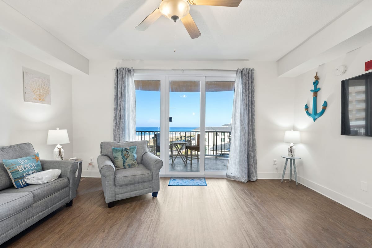 Condo, 1 Bedroom, Sea View (503) | Living area | 45-inch flat-screen TV with cable channels, TV