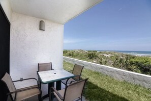Outdoor dining - Cozy Seaside Condo w/ Ocean Views - Pets Allowed! (St. Augustine)