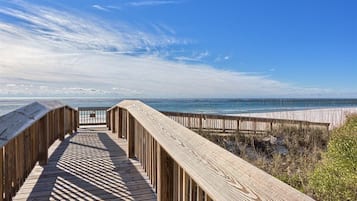 On the beach, sun-loungers