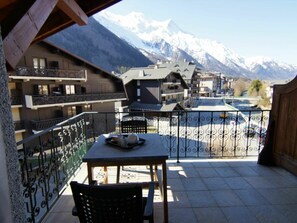 Enjoy breathtaking views of the surrounding mountains from this balcony.