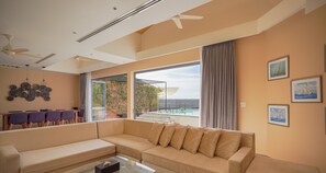 Family Villa, 4 Bedrooms, Partial Sea View | Living area | 50-inch LED TV with digital channels, TV, Netflix