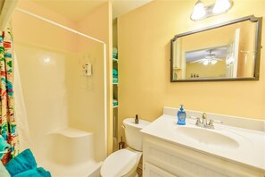 Combined shower/bathtub, hair dryer, towels, soap