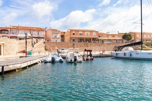 Marina - Apartment "Casa Spiaggia Molo 2" on Isola Rossa with Sea view & Balcony (Isola Rossa)