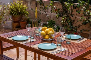 Outdoor dining - Vacation Home "Casa Ginebro" near Beach with 2 Private Terraces & Wi-Fi (Font de sa Cala)