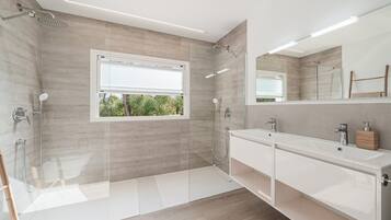 Shower, free toiletries, hair dryer, towels