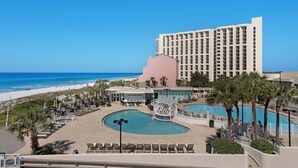 A resort with a large pool, beach, and a tall hotel building. - Gulf Front Condo w/Stunning Views, Private Beach Access, Gulf Front Pool! Tops'l Beach Resort (Miramar Beach)