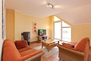 Fernseher, Kamin