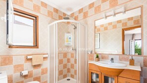 A bathroom with a shower, toilet, sink, and vanity. - Wonderful Villa Bellavista with Sea Views & Private Pool, Sleeps 8 (Arenal d'en Castell, Es Mercadal)