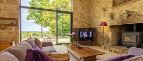 Smart TV, fireplace, DVD player, foosball