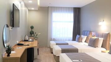 Egyptian cotton sheets, premium bedding, down duvets, minibar