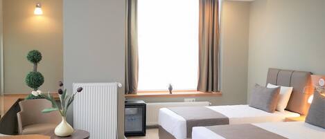 Egyptian cotton sheets, premium bedding, down comforters, minibar