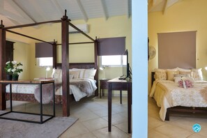 Ein Zimmer mit einem Himmelbett, einem Schreibtisch mit Lampe und einem Blumentopf.