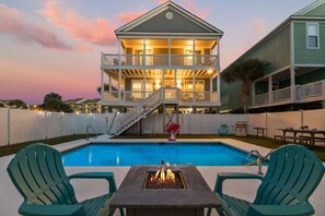 A two-story house with a balcony and a swimming pool. - Serenity by the Sea - Six Bedroom, Five Bath House with Private Pool (Surfside Beach)