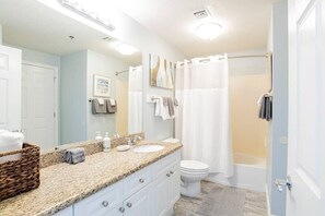 Combined shower/tub, hair dryer