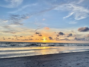 On the beach, sun-loungers, beach towels - A private beachfront condo just steps from beach (Indian Rocks Beach)