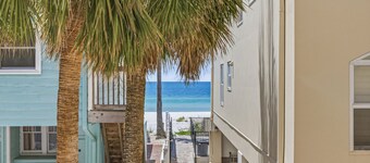 A private beachfront condo just steps from beach  