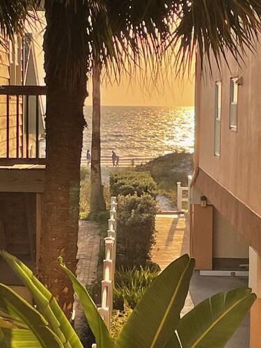 A private beachfront condo just steps from beach  