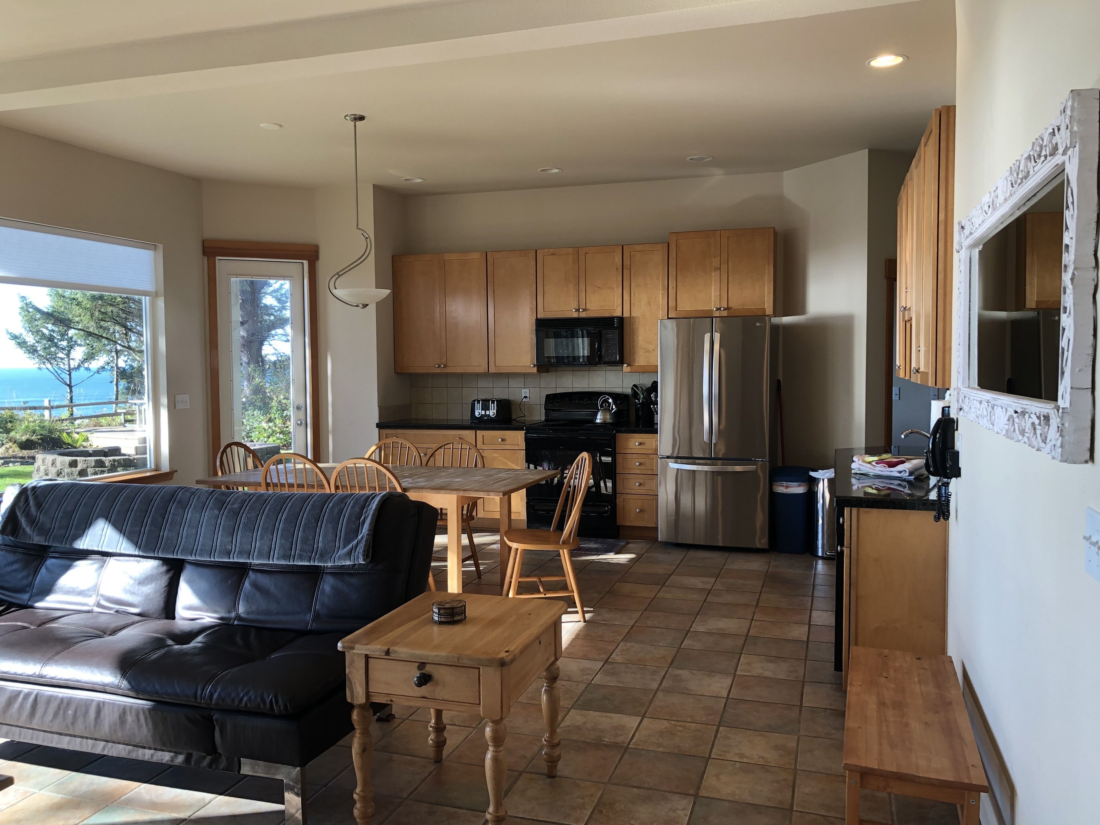 Breathtaking Beachfront Home on Two Acres of Private Forest