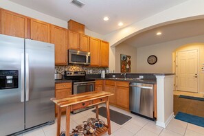 Microwave, dishwasher, coffee/tea maker, cookware/dishes/utensils