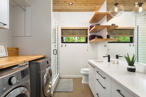 Shower, hair dryer, towels, soap