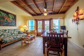TV, books - Charming 3 Bed Condo with Exquisite Caribbean View (San Pedro Town)