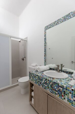 Bathtub, hair dryer, towels