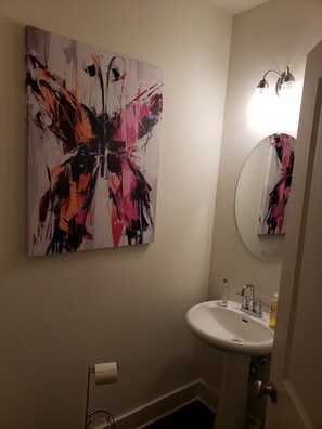 Combined shower/tub, hair dryer, towels, soap