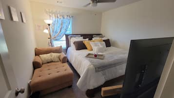 2 habitaciones, tabla de planchar con plancha y cuna de viaje