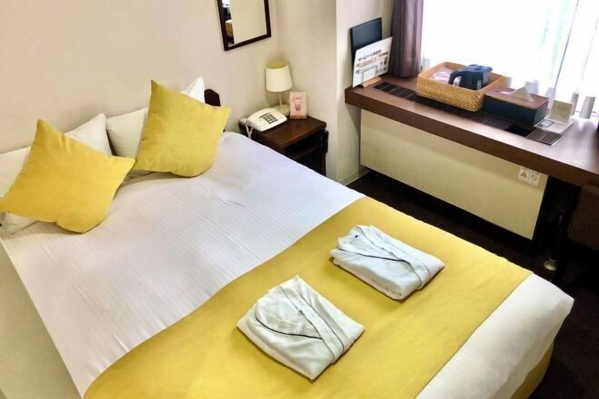 Desk, blackout drapes, WiFi (free), bed sheets