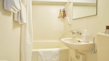 Combined shower/tub, free toiletries, hair dryer, bathrobes