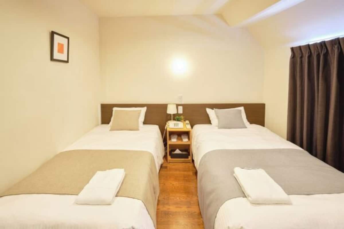 Desk, blackout curtains, free WiFi, bed sheets