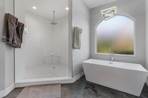 Bathtub, hair dryer, towels