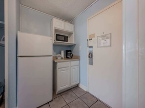 Fridge, microwave, coffee/tea maker, toaster