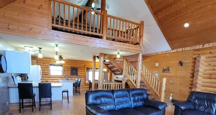 Log Cabin located minutes from Missouri River, airport, I-90, and downtown.