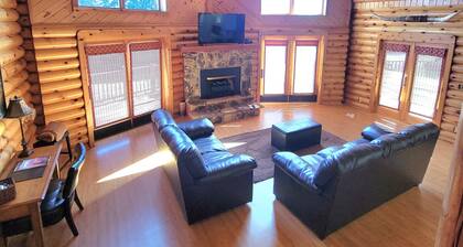 Log Cabin located minutes from Missouri River, airport, I-90 and downtown.