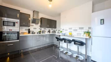 Apartamento | Cozinha privada | Fogão, cooktop, cafeteira/chaleira, chaleira elétrica