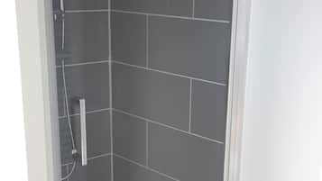 Ducha, toallas, papel higiénico