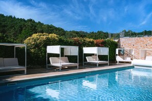 Indoor pool, seasonal outdoor pool, pool umbrellas, sun loungers