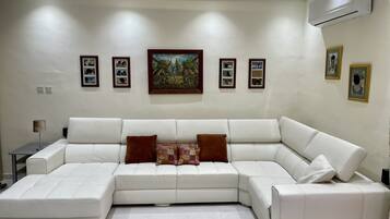 Apartment | Living room | 30-inch TV with cable channels